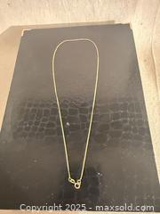 MaxSold Auction: 14K Yellow Gold 18 inch Necklace 1.29 grams  with Spring Ring Clasp - Toronto (Ontario, Canada) SELLER MANAGED Downsizing Online Auction -  Weston Road (CONDO)