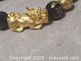MaxSold Auction: Pixiu 999 Feng Shui Bracelet - Toronto (Ontario, Canada) SELLER MANAGED Downsizing Online Auction - Mcadam Avenue