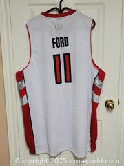MaxSold Auction: Toronto Raptors T.J. Ford Jersey 2XL - Toronto (Ontario, Canada) SELLER MANAGED Downsizing Online Auction - Mcadam Avenue