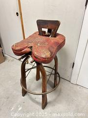 MaxSold Auction: Camel Saddle-Style Bar Stool with Leather Saddle Seat - Livermore (California, USA) SELLER MANAGED Estate Sale Online Auction - Hansen Road
