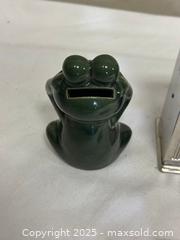 MaxSold Auction: Lot of 3 Coin Banks: 2 Ceramic Frog Banks & 1 Metal Slot Machine Bank - Livermore (California, USA) SELLER MANAGED Estate Sale Online Auction - Hansen Road