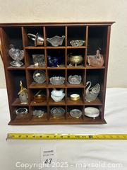 MaxSold Auction: Mid-Century Wooden 5x5 Cubby with Miniature Glass & Metal Salt Cellars - Livermore (California, USA) SELLER MANAGED Estate Sale Online Auction - Hansen Road