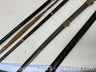MaxSold Auction: Mixed Lot: Decorative Walking Canes, Saber-style Sword & Kitana - Livermore (California, USA) SELLER MANAGED Estate Sale Online Auction - Hansen Road