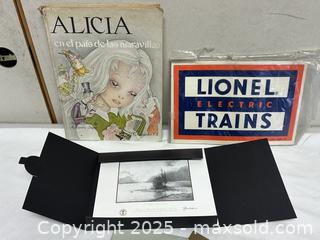 MaxSold Auction: Thomas Kinkade limited print + COA; Spanish edition book (Alicia en el país de las maravillas); Lionel Electric Trains sign - Livermore (California, USA) SELLER MANAGED Estate Sale Online Auction - Hansen Road