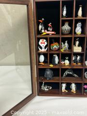 MaxSold Auction: Wooden Shadowbox Display Case with Glass Door & Penguin Figurines - Livermore (California, USA) SELLER MANAGED Estate Sale Online Auction - Hansen Road