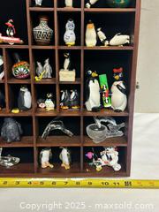 MaxSold Auction: Wooden Shadowbox Display Case with Glass Door & Penguin Figurines - Livermore (California, USA) SELLER MANAGED Estate Sale Online Auction - Hansen Road