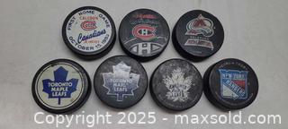 MaxSold Auction: 8x Hockey puck lot Toronto Maple Leafs and more - Toronto (Ontario, Canada) PARTNER MANAGED Reseller Online Auction - Queen Street West