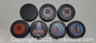 MaxSold Auction: 8x Hockey puck lot Toronto Maple Leafs and more - Toronto (Ontario, Canada) PARTNER MANAGED Reseller Online Auction - Queen Street West
