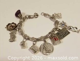 MaxSold Auction: Sterling Silver Charm Bracelet With 10 Charms - Aurora (Ontario, Canada) PARTNER MANAGED Downsizing Online Auction - Murray Drive
