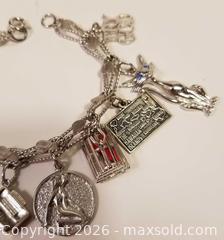 MaxSold Auction: Sterling Silver Charm Bracelet With 10 Charms - Aurora (Ontario, Canada) PARTNER MANAGED Downsizing Online Auction - Murray Drive
