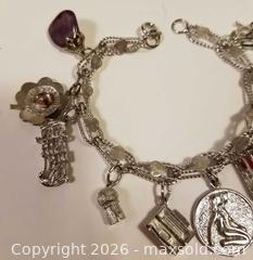 MaxSold Auction: Sterling Silver Charm Bracelet With 10 Charms - Aurora (Ontario, Canada) PARTNER MANAGED Downsizing Online Auction - Murray Drive