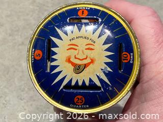 MaxSold Auction: 1930s Louis Kriegsfeld Tin Lithograph Rotating Coin Bank - London (Ontario, Canada) PARTNER MANAGED Downsizing Online Auction - Trillium Crescent