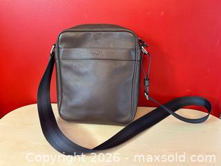 MaxSold Auction: Coach Men’s Charles Flight Bag – Brown Pebbled Leather Crossbody - London (Ontario, Canada) PARTNER MANAGED Downsizing Online Auction - Trillium Crescent