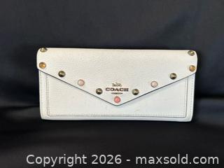 MaxSold Auction: Coach Studded Leather Envelope Wallet / Clutch – New York - London (Ontario, Canada) PARTNER MANAGED Downsizing Online Auction - Trillium Crescent