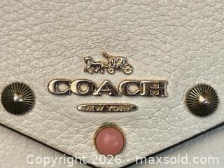 MaxSold Auction: Coach Studded Leather Envelope Wallet / Clutch – New York - London (Ontario, Canada) PARTNER MANAGED Downsizing Online Auction - Trillium Crescent
