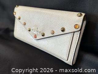 MaxSold Auction: Coach Studded Leather Envelope Wallet / Clutch – New York - London (Ontario, Canada) PARTNER MANAGED Downsizing Online Auction - Trillium Crescent