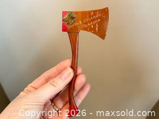 MaxSold Auction: Pair of Miniature Axes – Santa’s Village Souvenir & Red Plastic Toy - London (Ontario, Canada) PARTNER MANAGED Downsizing Online Auction - Trillium Crescent