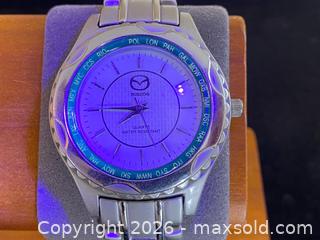 MaxSold Auction: Rare Mazda Promotional World Time Quartz Watch - London (Ontario, Canada) PARTNER MANAGED Downsizing Online Auction - Trillium Crescent