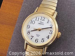 MaxSold Auction: Timex Indiglo Quartz Wristwatch – Gold Tone, Expansion Band - London (Ontario, Canada) PARTNER MANAGED Downsizing Online Auction - Trillium Crescent