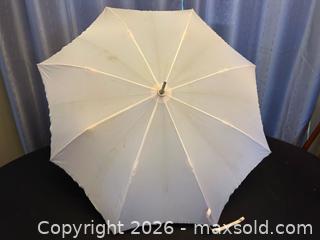 MaxSold Auction: Vintage Light Pink Parasol / Umbrella with Curved Handle - London (Ontario, Canada) PARTNER MANAGED Downsizing Online Auction - Trillium Crescent