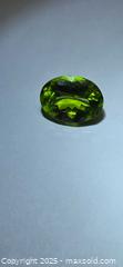 MaxSold Auction: Big beautiful vivid green Peridot  - Toronto (Ontario, Canada) PARTNER MANAGED Reseller Online Auction - Gerrard Street East (CONDO)