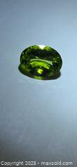 MaxSold Auction: Big beautiful vivid green Peridot  - Toronto (Ontario, Canada) PARTNER MANAGED Reseller Online Auction - Gerrard Street East (CONDO)