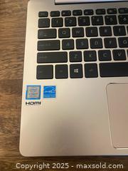 MaxSold Auction: This is an Asus ZenBook 13 (UX331) series ultra-slim laptop. - Vancouver (British Columbia, Canada) SELLER MANAGED Downsizing Online Auction - West Broadway (CONDO)