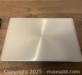 MaxSold Auction: This is an Asus ZenBook 13 (UX331) series ultra-slim laptop. - Vancouver (British Columbia, Canada) SELLER MANAGED Downsizing Online Auction - West Broadway (CONDO)