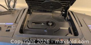 MaxSold Auction: Portable Stereo, Walkman and Vintage Tin B - London (Ontario, Canada) PARTNER MANAGED Downsizing Online Auction - Ford Crescent