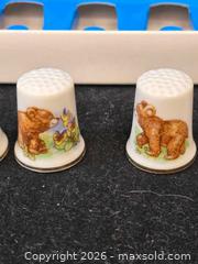MaxSold Auction: 12 complete sets of miniature thimbles featuring teddy bear designs, packaged in blue boxe - Toronto (Ontario, Canada) SELLER MANAGED Reseller Online Auction - Dartmoor Drive