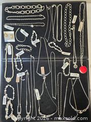 MaxSold Auction: assortment of costume jewelry, primarily silver-tone necklaces, bracelets, and a pair of e - Toronto (Ontario, Canada) SELLER MANAGED Reseller Online Auction - Dartmoor Drive