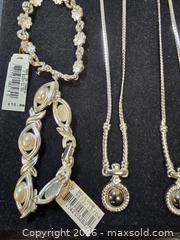 MaxSold Auction: assortment of costume jewelry, primarily silver-tone necklaces, bracelets, and a pair of e - Toronto (Ontario, Canada) SELLER MANAGED Reseller Online Auction - Dartmoor Drive