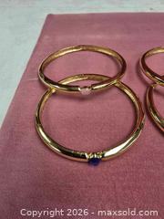 MaxSold Auction: collection of gold-tone plated bangles with various colored crystals - Toronto (Ontario, Canada) SELLER MANAGED Reseller Online Auction - Dartmoor Drive