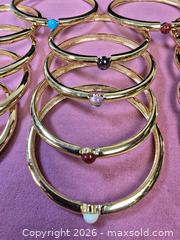 MaxSold Auction: collection of gold coloured  bangle bracelets featuring various multi-colored stone or bea - Toronto (Ontario, Canada) SELLER MANAGED Reseller Online Auction - Dartmoor Drive
