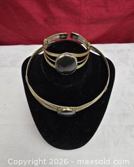 MaxSold Auction: vintage-style gold-tone choker necklace and cuff bracelet set with large black oval caboch - Toronto (Ontario, Canada) SELLER MANAGED Reseller Online Auction - Dartmoor Drive