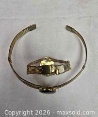 MaxSold Auction: vintage-style gold-tone choker necklace and cuff bracelet set with large black oval caboch - Toronto (Ontario, Canada) SELLER MANAGED Reseller Online Auction - Dartmoor Drive