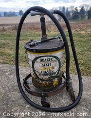 MaxSold Auction: Vintage Quaker State Golden Chassis Lubricant Drum on Roller  - East Cocalico Township (Pennsylvania, USA) SELLER MANAGED Downsizing Online Auction - Stevens Road                   