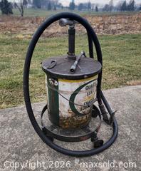 MaxSold Auction: Vintage Quaker State Golden Chassis Lubricant Drum on Roller  - East Cocalico Township (Pennsylvania, USA) SELLER MANAGED Downsizing Online Auction - Stevens Road                   
