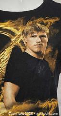 MaxSold Auction: Hunger Games t shirt  - Toronto (Ontario, Canada) SELLER MANAGED Commercial Liquidation Online Auction - Revlis Crescent