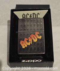 MaxSold Auction: Zippo lighter ( AC/DC ) - Toronto (Ontario, Canada) SELLER MANAGED Commercial Liquidation Online Auction - Revlis Crescent