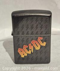 MaxSold Auction: Zippo lighter ( AC/DC ) - Toronto (Ontario, Canada) SELLER MANAGED Commercial Liquidation Online Auction - Revlis Crescent