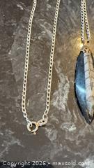 MaxSold Auction: Vintage Orthoceras Fossil Pendant Necklace, Silver-Tone Chain - Pickering (Ontario, Canada) PARTNER MANAGED Reseller Online Auction -  Granite Court