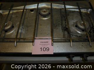 MaxSold Auction: Coleman Three-Burner Propane Camping Stove (fits 2–3 pans) - New Westminster (British Columbia, Canada) SELLER MANAGED Downsizing Online Auction - Eighth Street