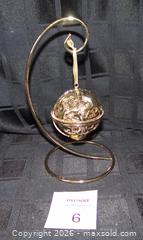 MaxSold Auction: Disney Alice Through the Looking Glass Gold-Tone Ornament - New Westminster (British Columbia, Canada) SELLER MANAGED Downsizing Online Auction - Eighth Street