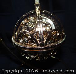 MaxSold Auction: Disney Alice Through the Looking Glass Gold-Tone Ornament - New Westminster (British Columbia, Canada) SELLER MANAGED Downsizing Online Auction - Eighth Street