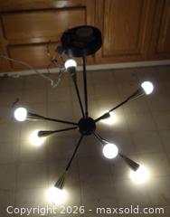 MaxSold Auction: Sputnik-Style 8-Arm Matte Black & Brass Chandelier - New Westminster (British Columbia, Canada) SELLER MANAGED Downsizing Online Auction - Eighth Street