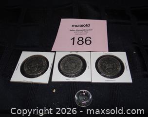 MaxSold Auction: Three 1971 Canadian Dollars and one 1967 Nickel  - New Westminster (British Columbia, Canada) SELLER MANAGED Downsizing Online Auction - Eighth Street