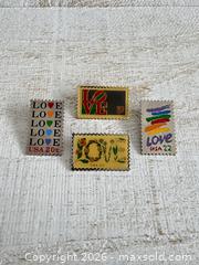 MaxSold Auction: Set of Four Vintage Stamp Pin Brooches - Kingston (Ontario, Canada) SELLER MANAGED Downsizing Online Auction - Bishop Street