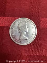 MaxSold Auction:  1958 Canadian Silver  Dollar Totem Pole  - Coquitlam (British Columbia, Canada) SELLER MANAGED Downsizing Online Auction - Delestre Avenue