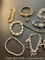 MaxSold Auction: Vintage Costume Jewelry, Bracelets, Brooches, Earrings - Coquitlam (British Columbia, Canada) SELLER MANAGED Downsizing Online Auction - Delestre Avenue